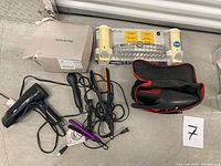Hair dryer, hair irons, clipper in case, Amoena box, suction rack