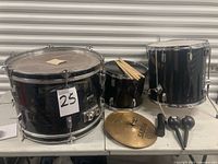 Overall view showing three drums, cymbal, maracas, drumsticks