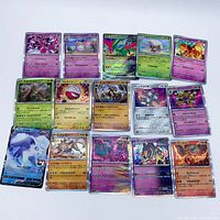 All 15 Japanese Pokémon cards laid out, showing fronts and foil surfaces