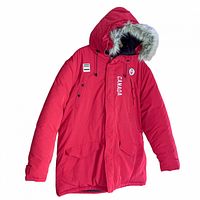 Front view of red Hudson's Bay Team Canada parka with hood up, showing patches and faux fur trim