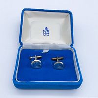 Cufflinks in original Birks case, swirl fronts visible