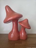 Front view of coral ceramic double mushroom sculpture