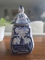 front view showing windmill scene and lid