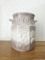 Front view showing embossed fruit and rumtopf lettering