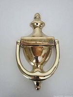 front view of brass door knocker