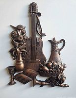 Full view of Coppercraft Guild copper-tone molded resin wall plaque