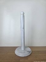 Front view assembled, showing full height and marble pattern