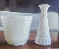 Hobnail vase and geometric bud vase side by side
