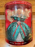 Front view of boxed Happy Holidays Barbie showing doll and packaging