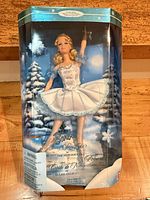 Front view of boxed Nutcracker Snowflake Barbie doll