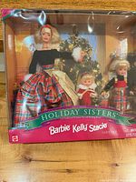Front view of sealed Holiday Sisters Barbie Kelly Stacie Gift Set