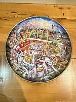 Front of decorative plate showing detailed McDonald's street scene illustration