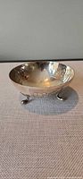 Full view of footed silver candy bowl