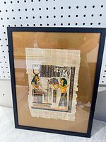 Full view of framed papyrus artwork