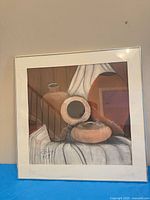 Front view of framed Le Roux pottery print