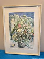 Front view of framed floral watercolor showing artwork, mat and frame