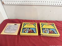 Front view of three opera record albums