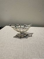 Front view of sterling silver pierced candy basket