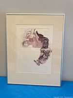 Full view of framed monotype under glass