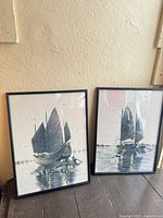 Both framed watercolours side by side showing imagery and frames