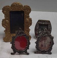 Group of four antique picture frames