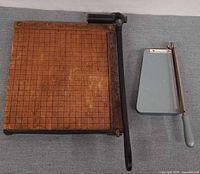 Both paper cutters side by side for size comparison