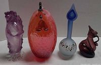 Front view of all four art glass pieces