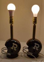 Front view of both helmet lamps lit