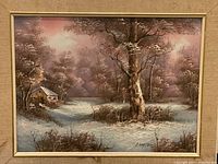 Full view of framed painting showing entire winter landscape and frame