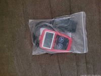 Code reader sealed in plastic bag
