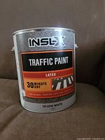 Front view of INSL-X TP-2210 white traffic paint can