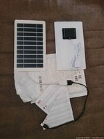 Front view showing photovoltaic cell surface and separate cables