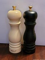 Two BILL.F grinders cream and black front view