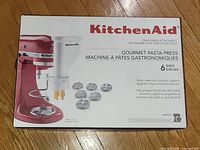 Front of sealed KitchenAid Gourmet Pasta Press box
