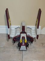 Front angled view showing shuttle nose, dual cockpit and wing positioning