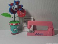 Overall lot showing Wildflowerzz flower and BeDazzler tool side by side