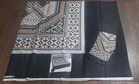 Flat sheet laid out showing mosaic pattern and included pillowcases