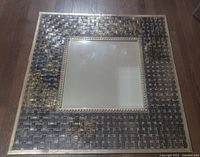 Full view of square ceramic basket-weave framed mirror