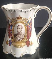 Front view showing portrait, coronation text and flags