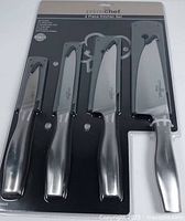 Front view of Prime Chef 4-piece knife set in package
