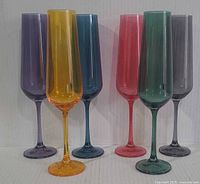 Front view of six coloured crystal flutes