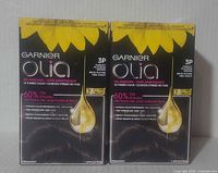 Front view of two Gardiner Olia hair color boxes showing branding, shade 3P