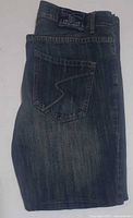 Folded jeans showing overall color and texture