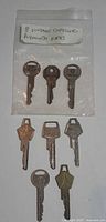 Eight vintage Chrysler and Plymouth keys in bag