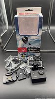 Boxed Somikon 720p action camera with accessories displayed