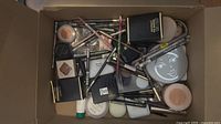 Top view of box showing full assortment of makeup items
