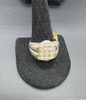 Front view showing square face with 9 stones