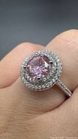 Top view showing pink sapphire and double halo