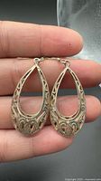 Front view of both sterling silver filigree teardrop earrings