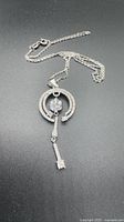 Full view of sterling silver necklace showing pendant and chain